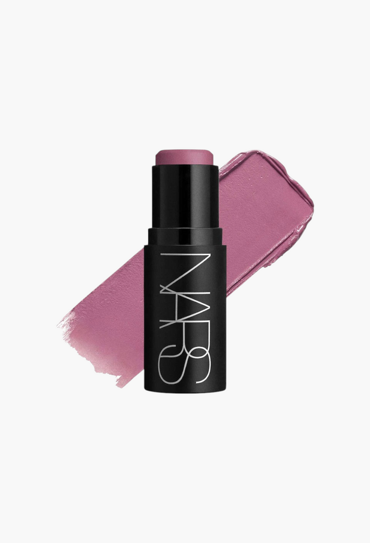 GLAM MODA NARS multipurpose soft blur blush stick in a mauve shade with a creamy swatch on a white background