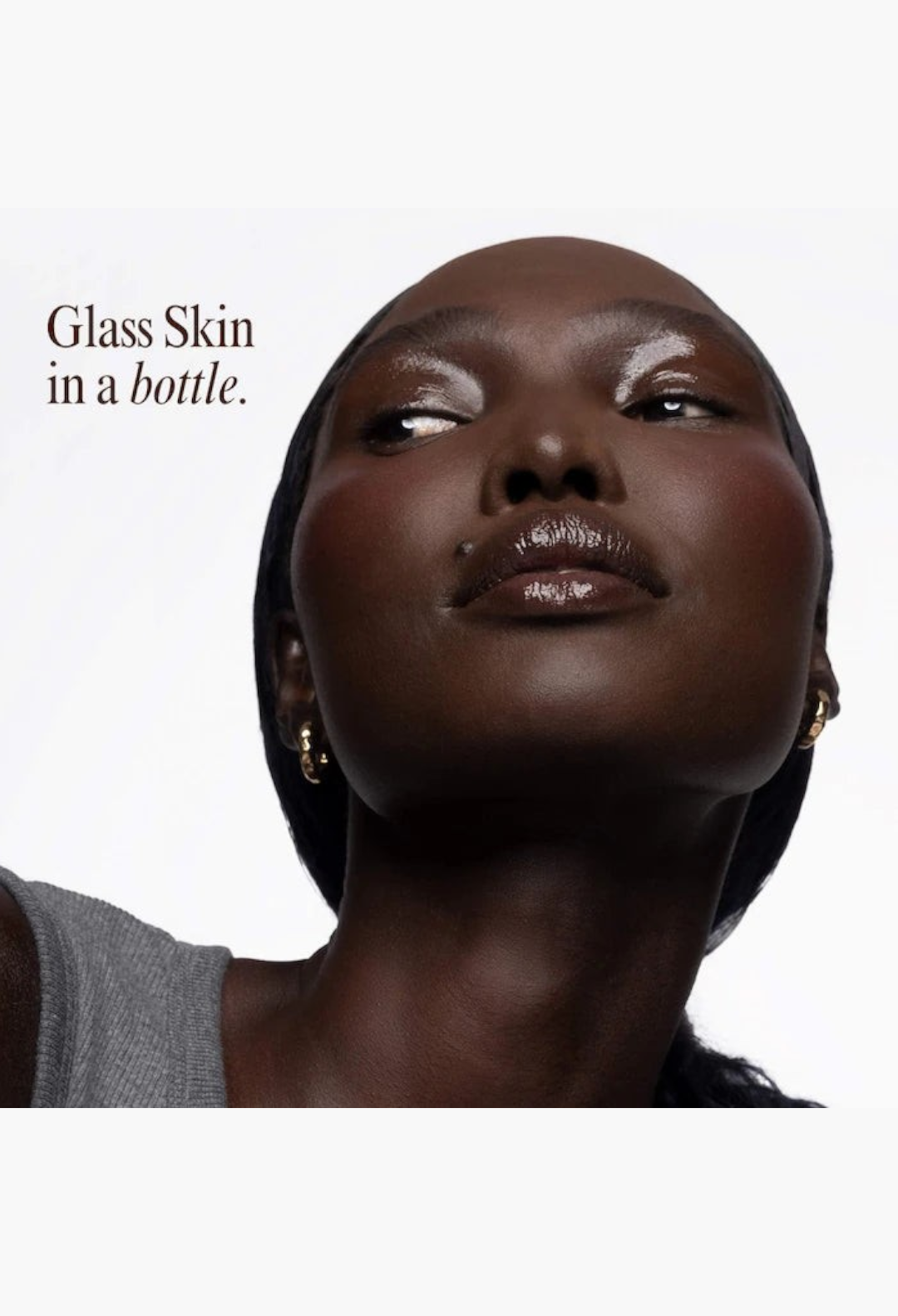 GLAM MODA Hyper Shine Glass Skin Makeup Mixing Serum applied on a model for a dewy, luminous, and glossy finish.