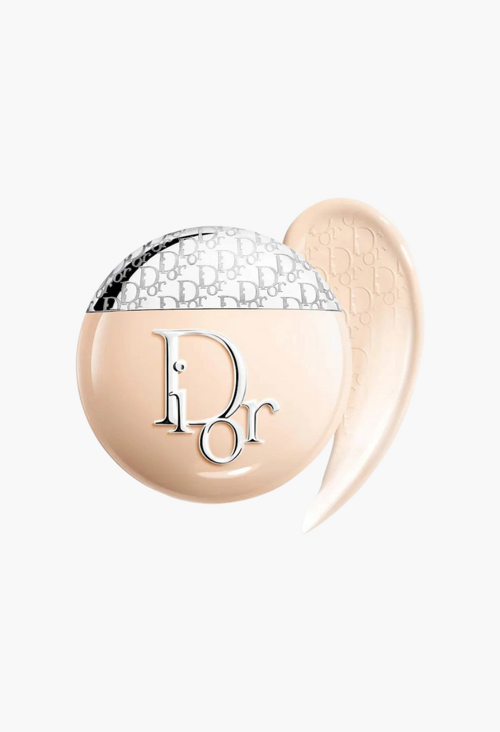 GLAM MODA Dior Backstage Glow-Up Skin Tint hydrating moisturizer with SPF 20 in a round compact with liquid swatch