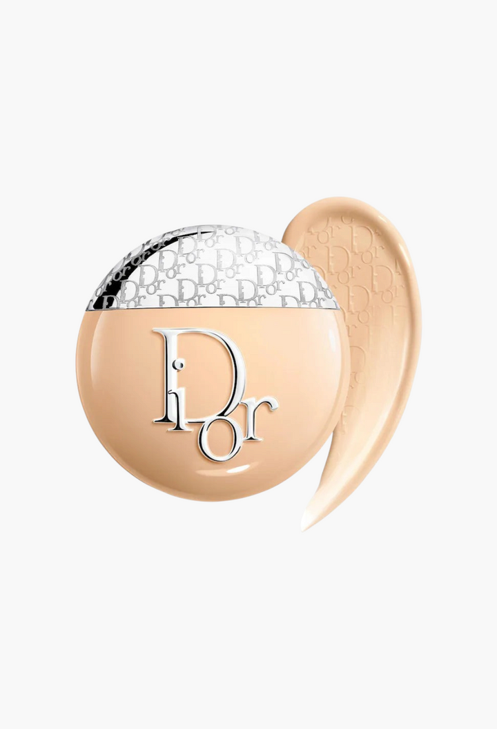 GLAM MODA Dior Backstage Glow-Up Skin Tint hydrating liquid moisturizer with SPF 20 in a round compact bottle