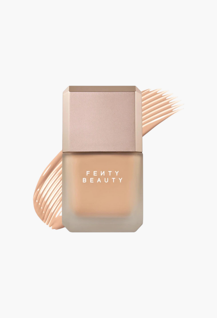GLAM MODA Fenty Beauty Pro Filt'r liquid foundation in a frosted glass bottle with a beige cap and foundation swatch.