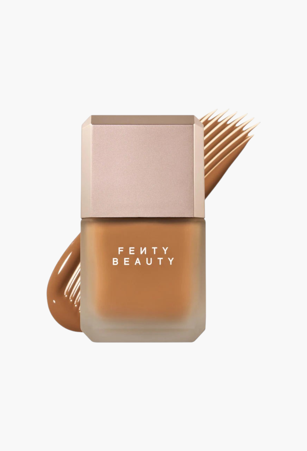 GLAM MODA Fenty Beauty Pro Filt'r liquid foundation in a frosted glass bottle with a tan shade swatch behind it.