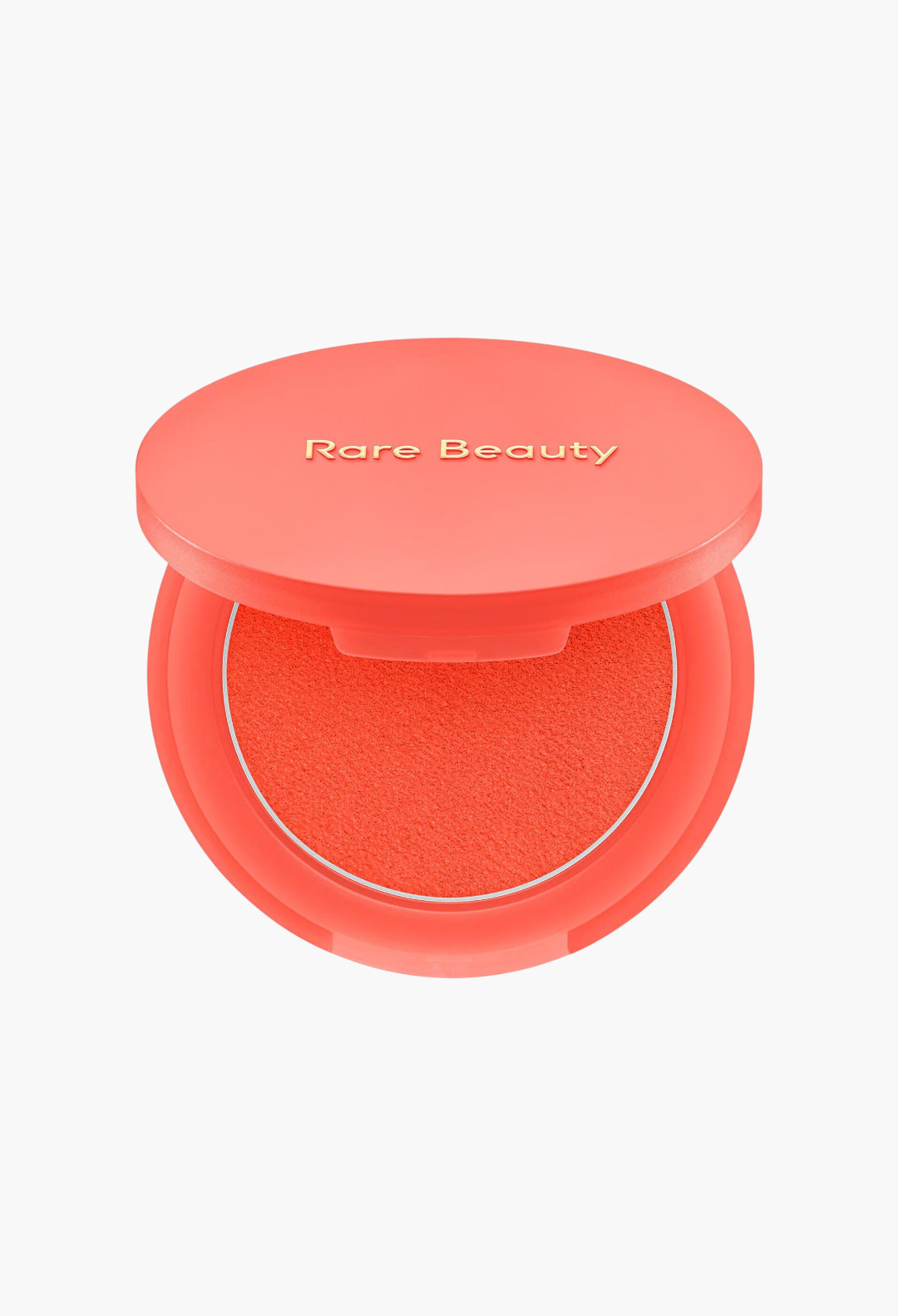 GLAM MODA Soft Pinch Matte Bouncy Blush in a vibrant coral shade with a smooth, putty-like texture in a round compact