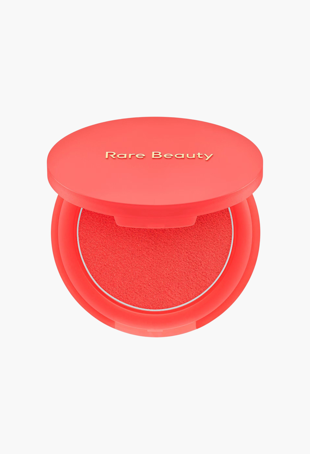 GLAM MODA Soft Pinch Matte Bouncy Blush in a vibrant coral shade with a smooth, weightless putty texture.