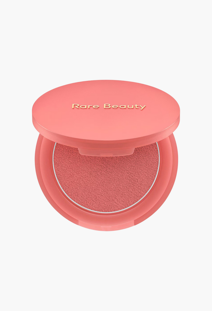 GLAM MODA Soft Pinch Matte Bouncy Blush in a coral pink shade with a smooth, buildable putty texture in a compact.
