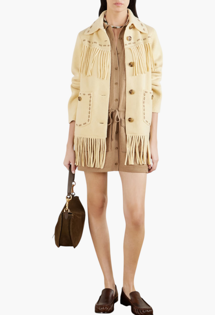 GLAM MODA yellow wool-blend Western jacket with long fringe, stitched trims, and button-down front on a model.